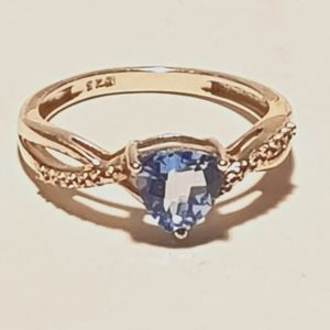 Faceted tri cut sky blue topaz and .925 sterling ring in 5.5